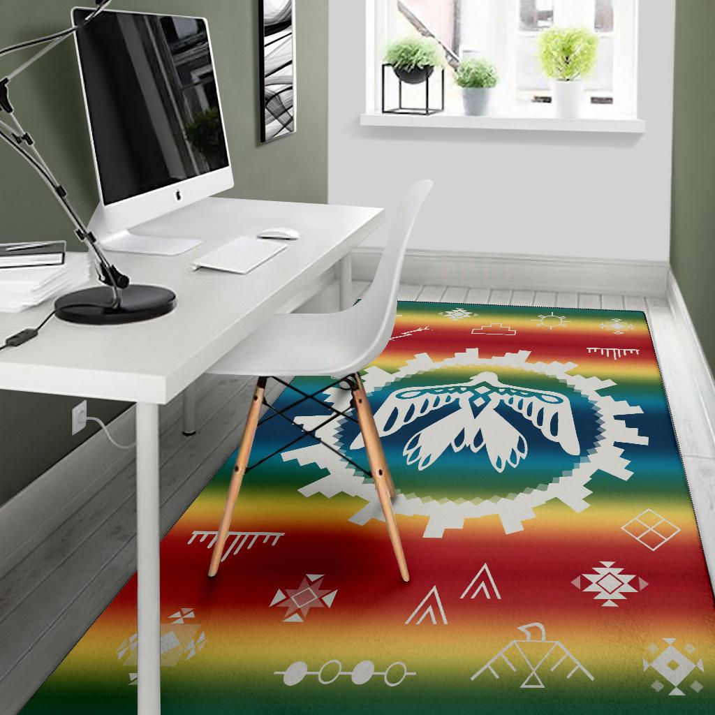 Rainbow rug with blue feather motif and geometric icons, rectangular area rug