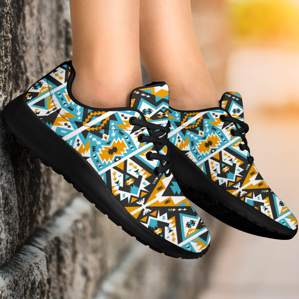 Multicolor patterned lace-up sport sneakers with black sole worn on feet
