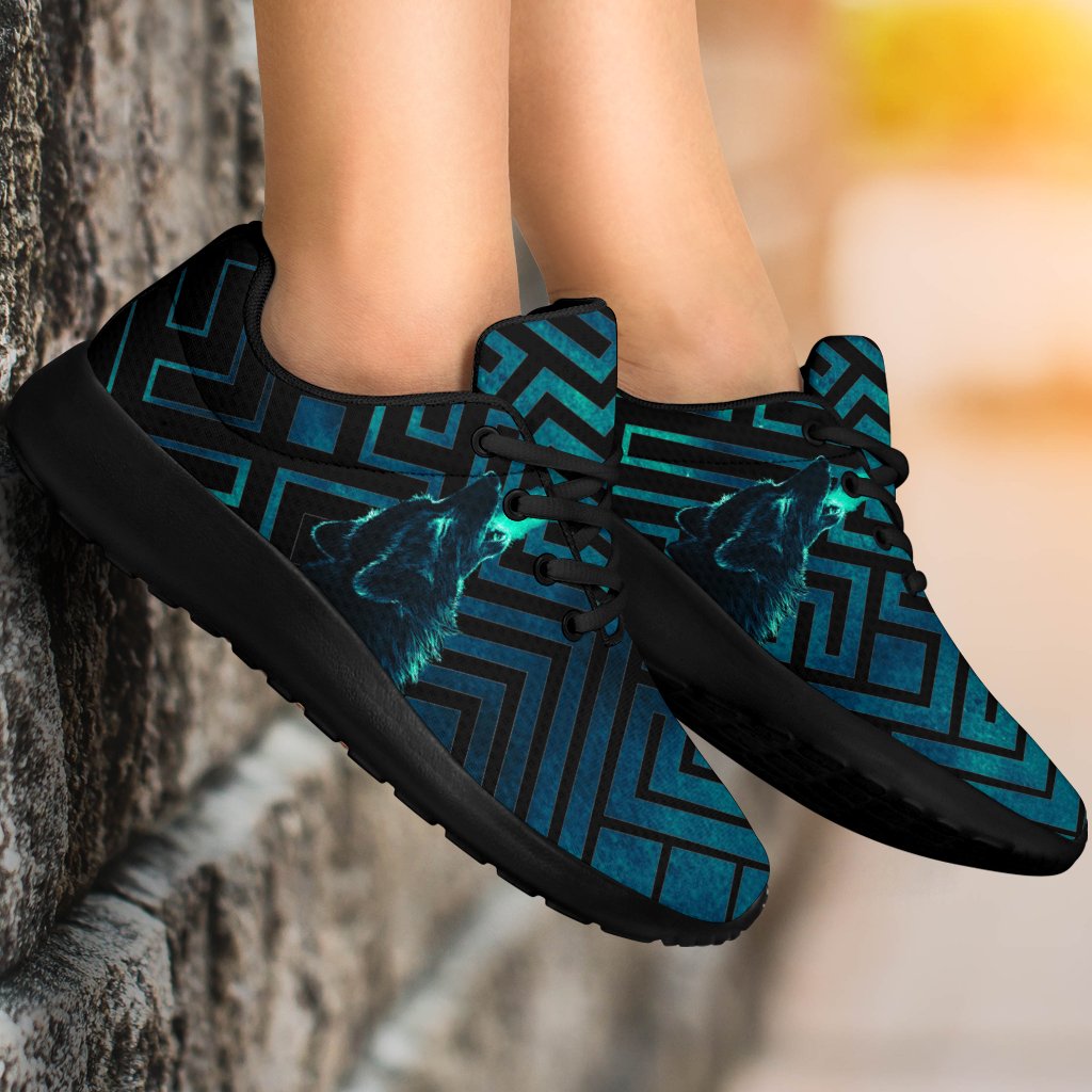 Blue-and-black lace-up sport sneakers with glowing wolf graphic and turquoise geometric pattern