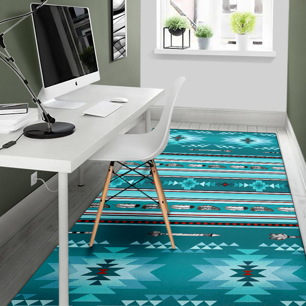 Teal area rug with geometric starburst shapes and striped bird band