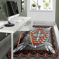 Native American style area rug with dark gray base, central wheel medallion, and red zigzag edge