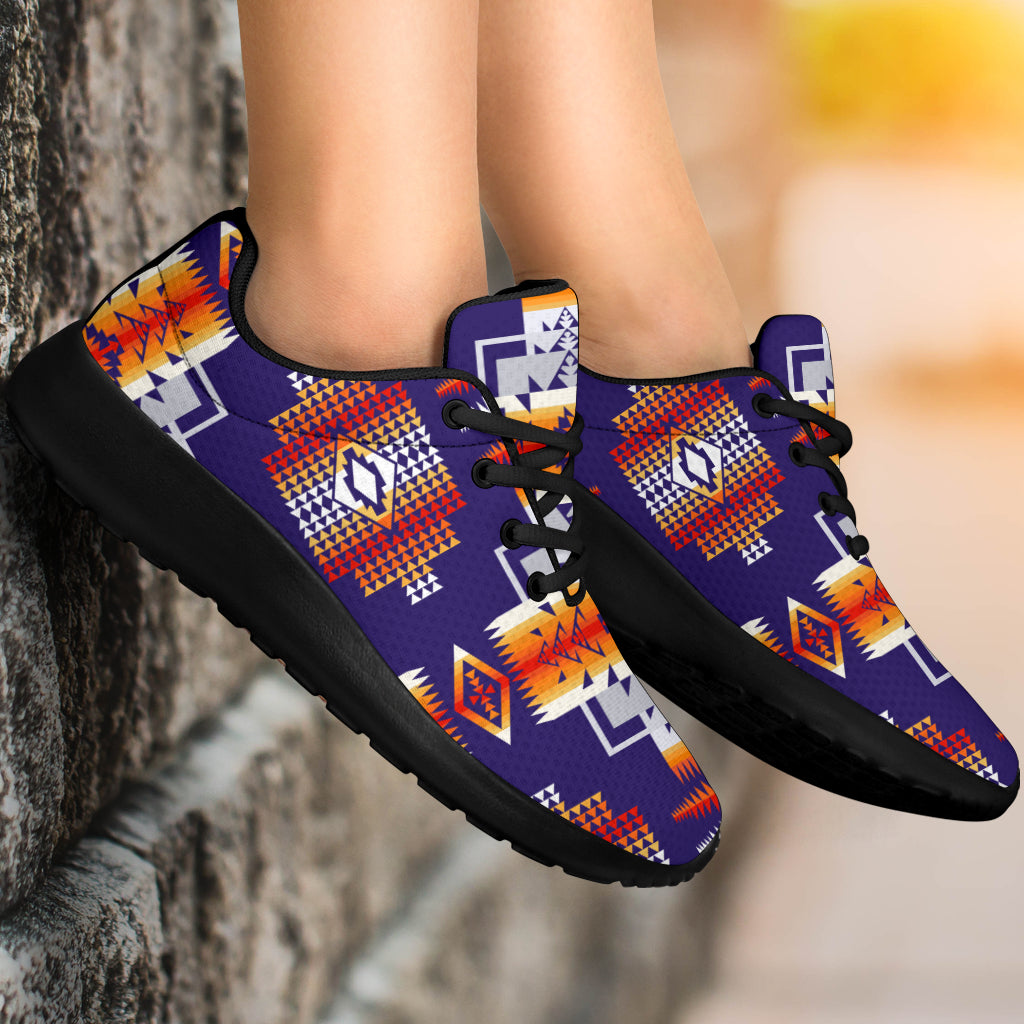 Purple native-pattern sport sneakers close-up on feet, black laces and black sole