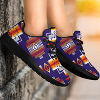 Purple native-pattern sport sneakers close-up on feet, black laces and black sole
