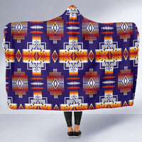 Purple hooded blanket with all-over geometric motifs in orange, white, and blue tones