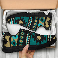 Aztec print sneakers in a box, black sole and turquoise/gold patterned upper