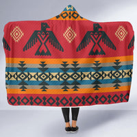 Red hooded blanket with tribal geometric print and multicolor stripe bands