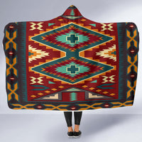 Red multicolor geometric hooded blanket with central cross motif and diamond patterns
