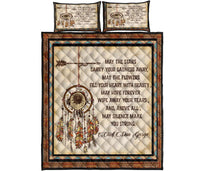Quilt bed set top view: dreamcatcher border and quote text on cream with two pillow covers