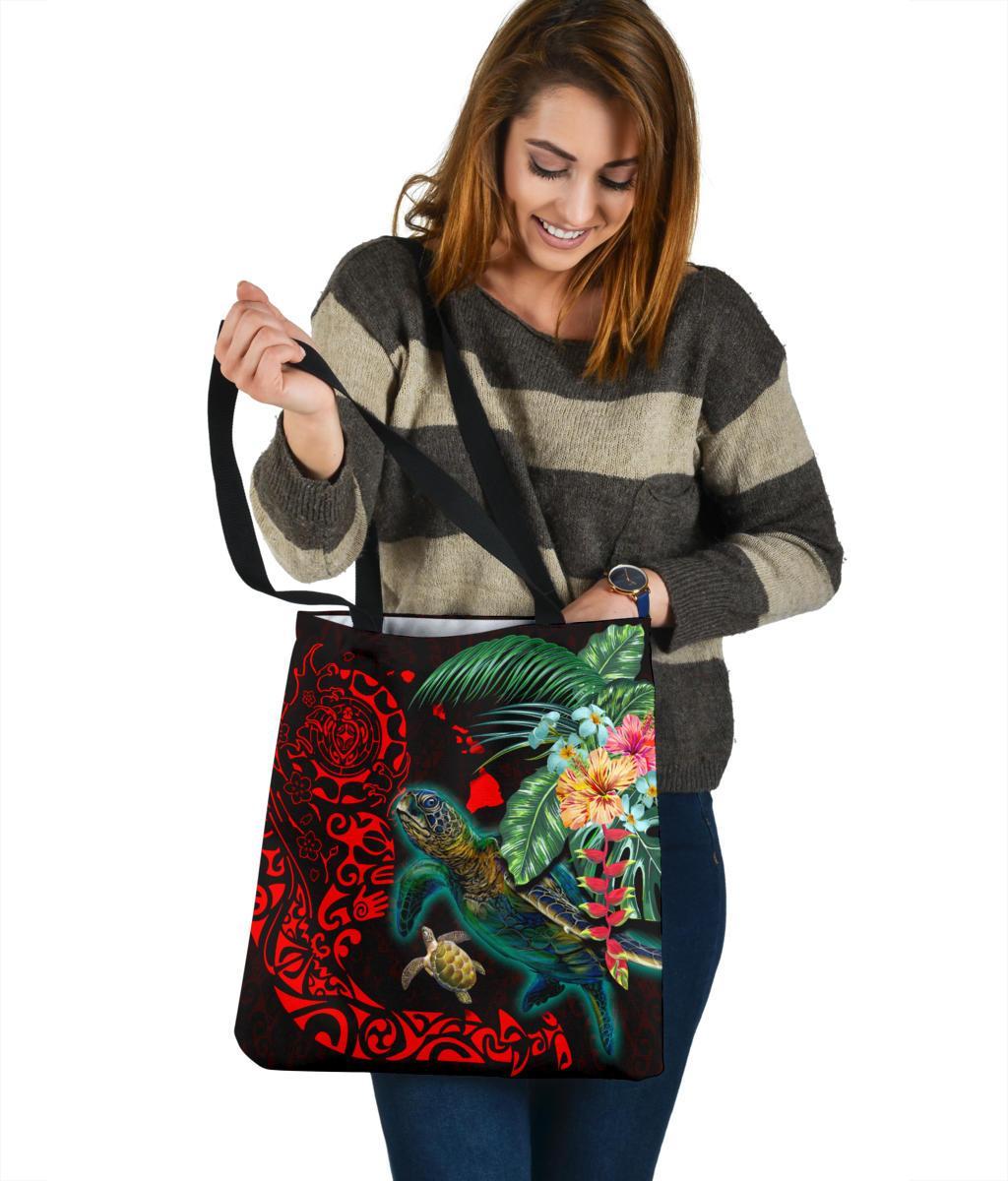Black Polynesian tote with turtle and hibiscus flowers, red tribal swirls, shoulder carry.