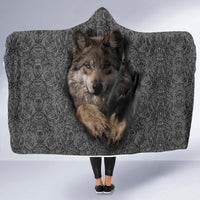 Gray hooded blanket with wolf face graphic and swirl pattern, front view