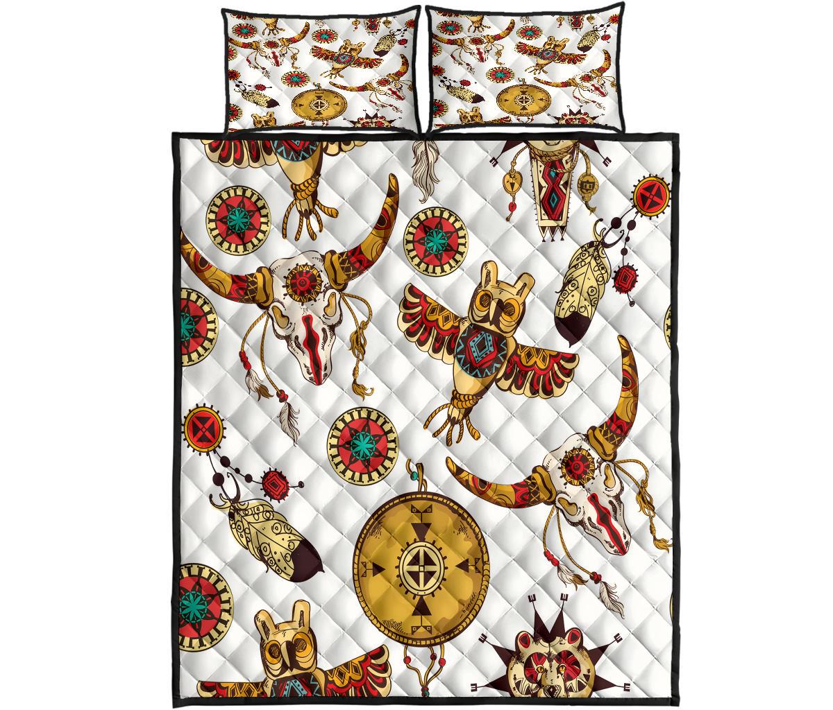 Quilt bed set with multicolor native-style icons, includes two matching pillows