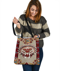 Red tote bag with Native mandala thunderbird print and black handle strap