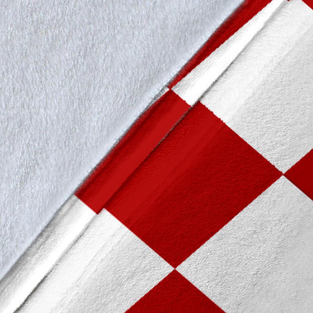 Close-up of red-and-white checker pattern on the Croatia blanket fabric