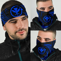Blue tribal wave bandana with black swirls, covering face and neck