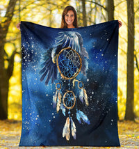 Blue galaxy dreamcatcher blanket held open, multi-ring motif with blue feather accents