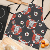 Close-up apron fabric: dark gray with red roses, white daisies, and white bull head print