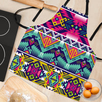 Close-up multicolor geometric apron with black trim along the top strap and hem