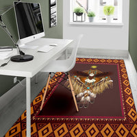Brown dreamcatcher area rug with owl graphic, orange geometric border and maroon frame