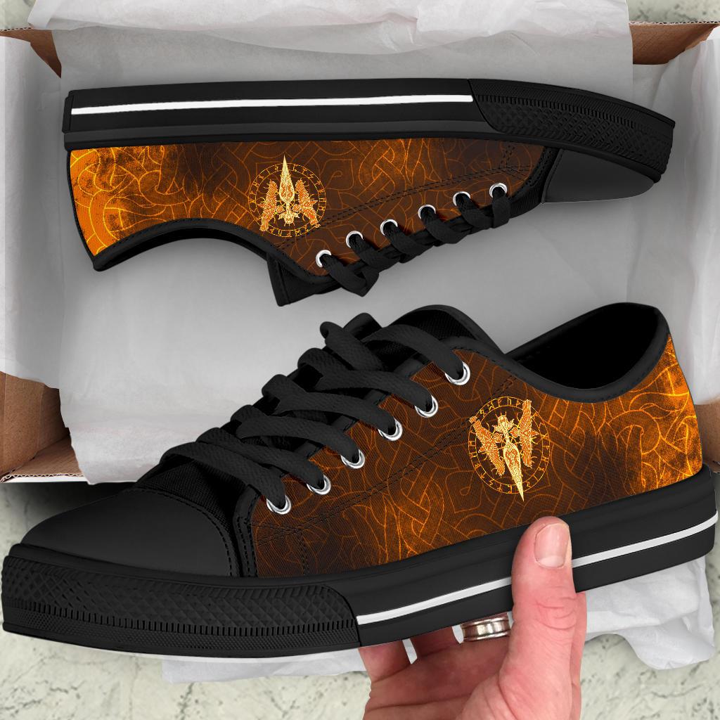 Viking low-top sneakers with black laces, black sole, orange-brown upper and gold spear/ravens