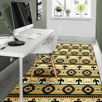 Striped geometric Native American area rug with yellow base and multicolor bands