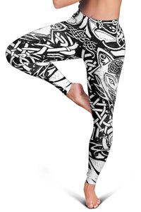 Black and gray leggings with close-up Viking wolf tattoo graphic and geometric rune shapes