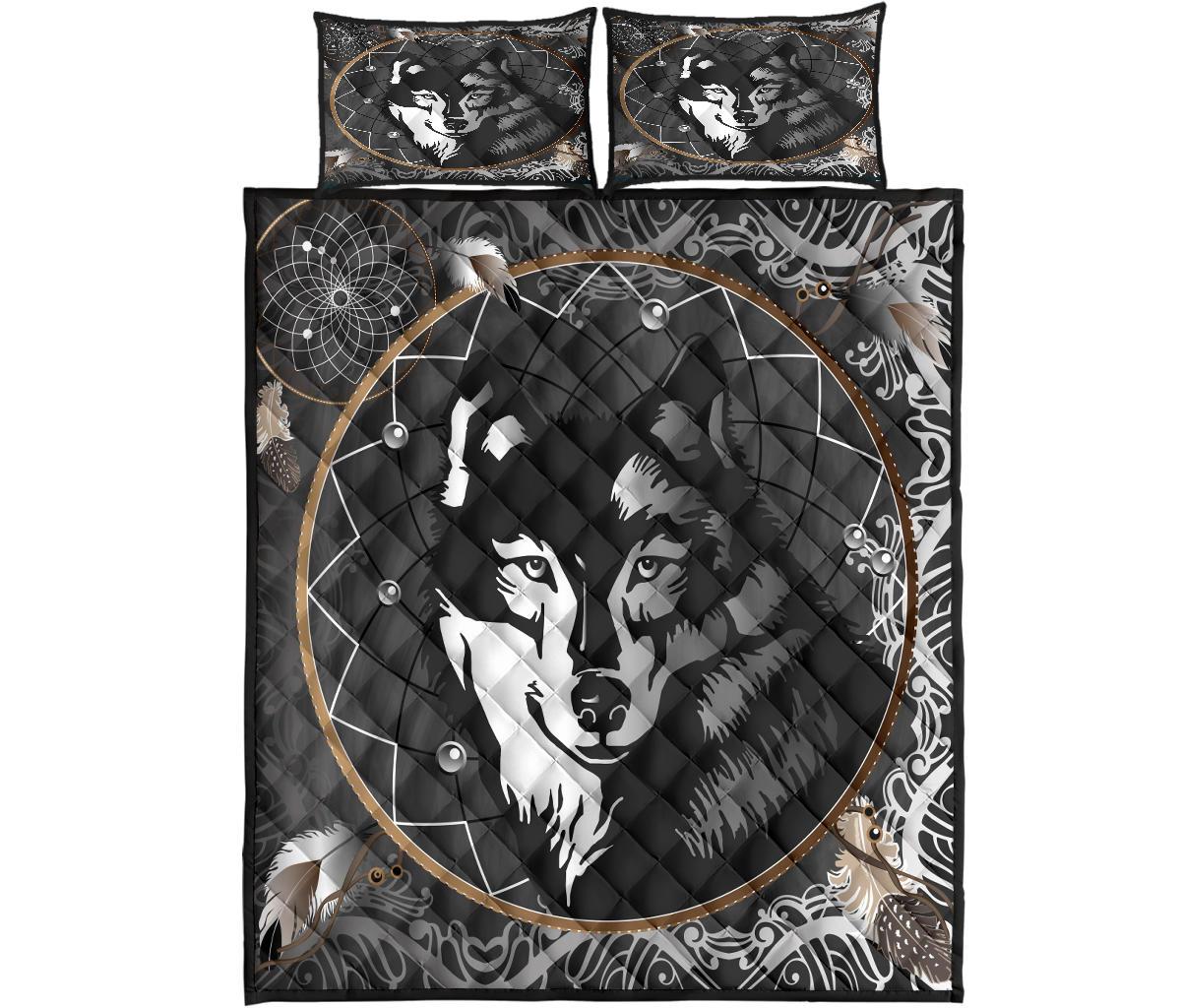 Black wolf dreamcatcher quilt and two pillows, centered wolf face with oval trim