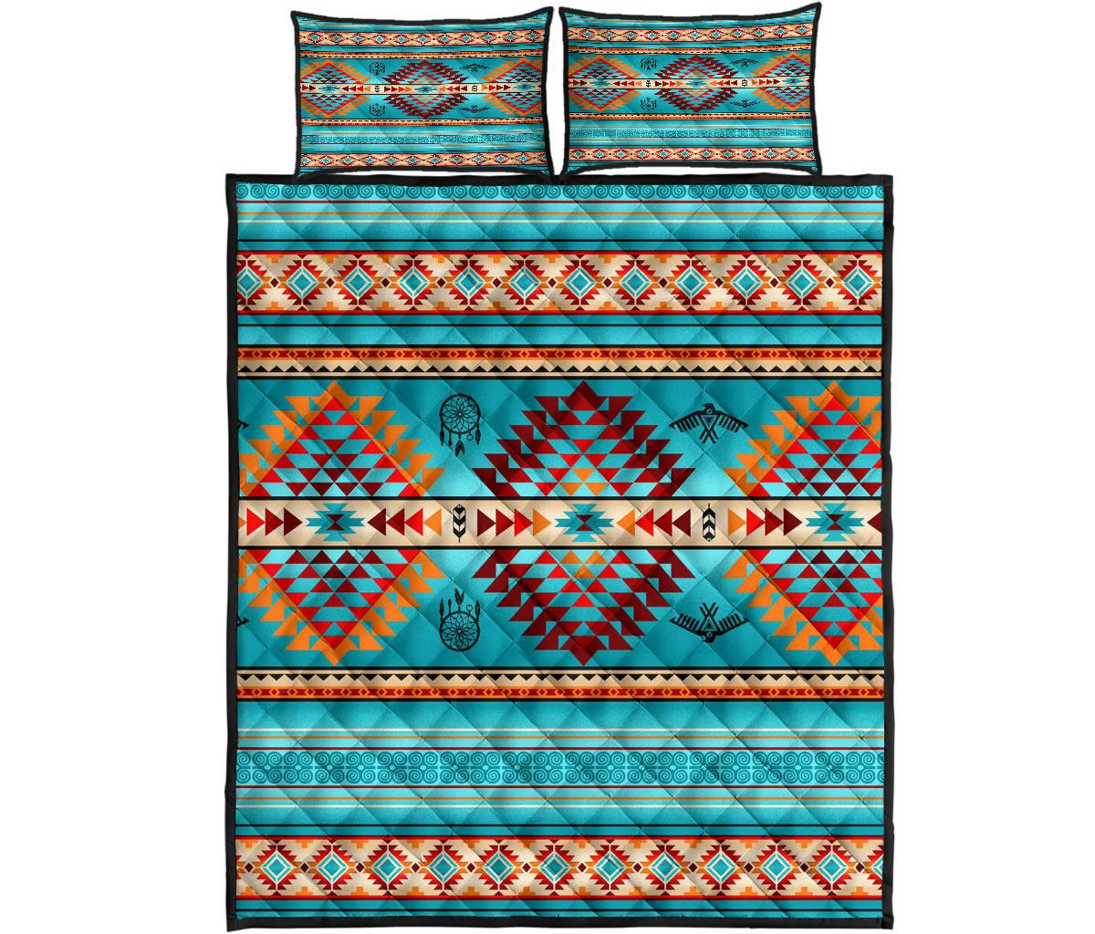 Multicolor Native quilt bed set front view with geometric stripes and two pillowcases