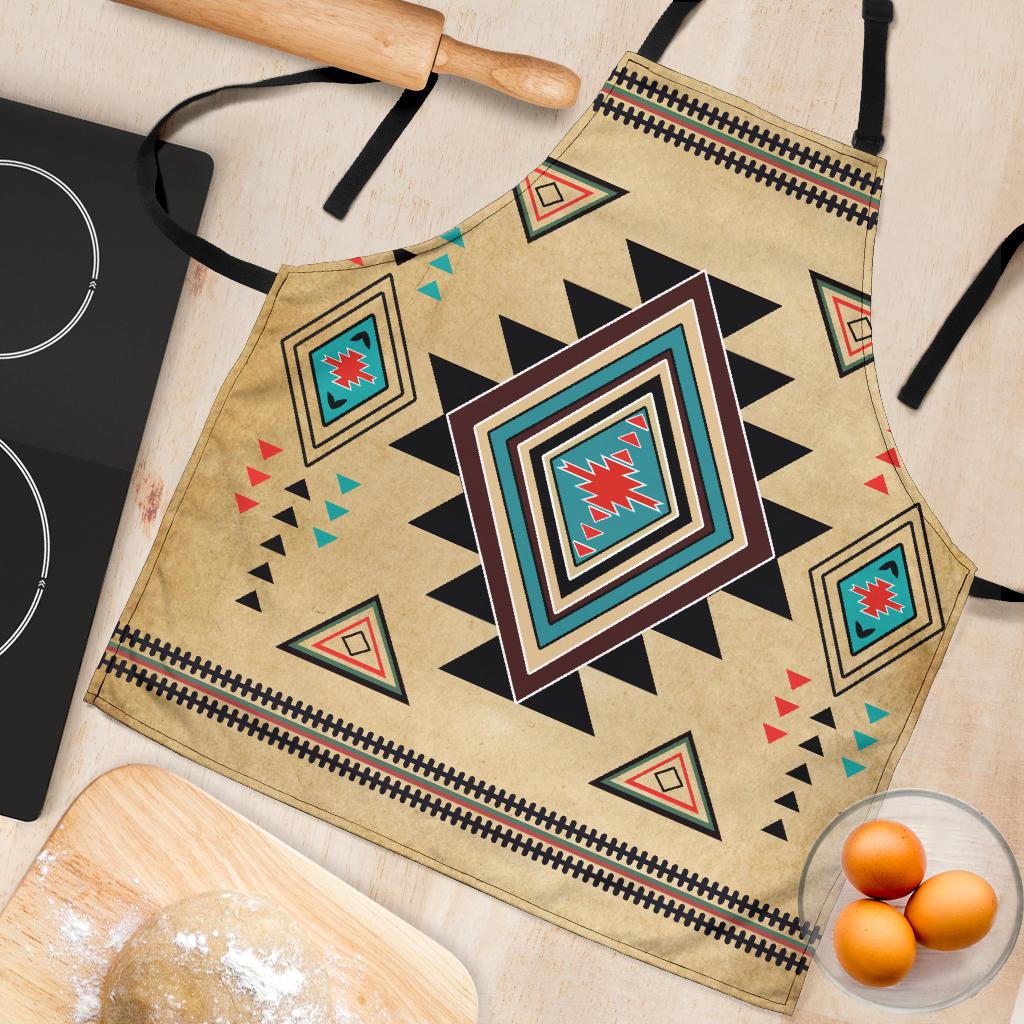 Beige apron close-up with multicolor southwest diamond emblem and patterned trim border