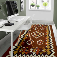 Brown geometric rug with multicolor diamonds and zigzag border