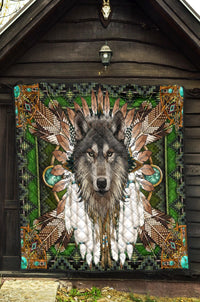 Wolf mandala quilt hanging on wall, green multicolor tribal wolf design with black trim