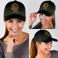 Black cap with gold Viking owl front emblem; worn with adjustable back