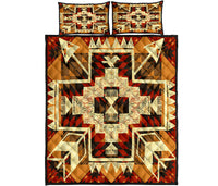 Quilt bed set top view: tribal arrow design in tan, cream, and red with central star