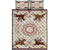 Quilt set front view: horse riders, red sunburst medallion, two matching pillowcases