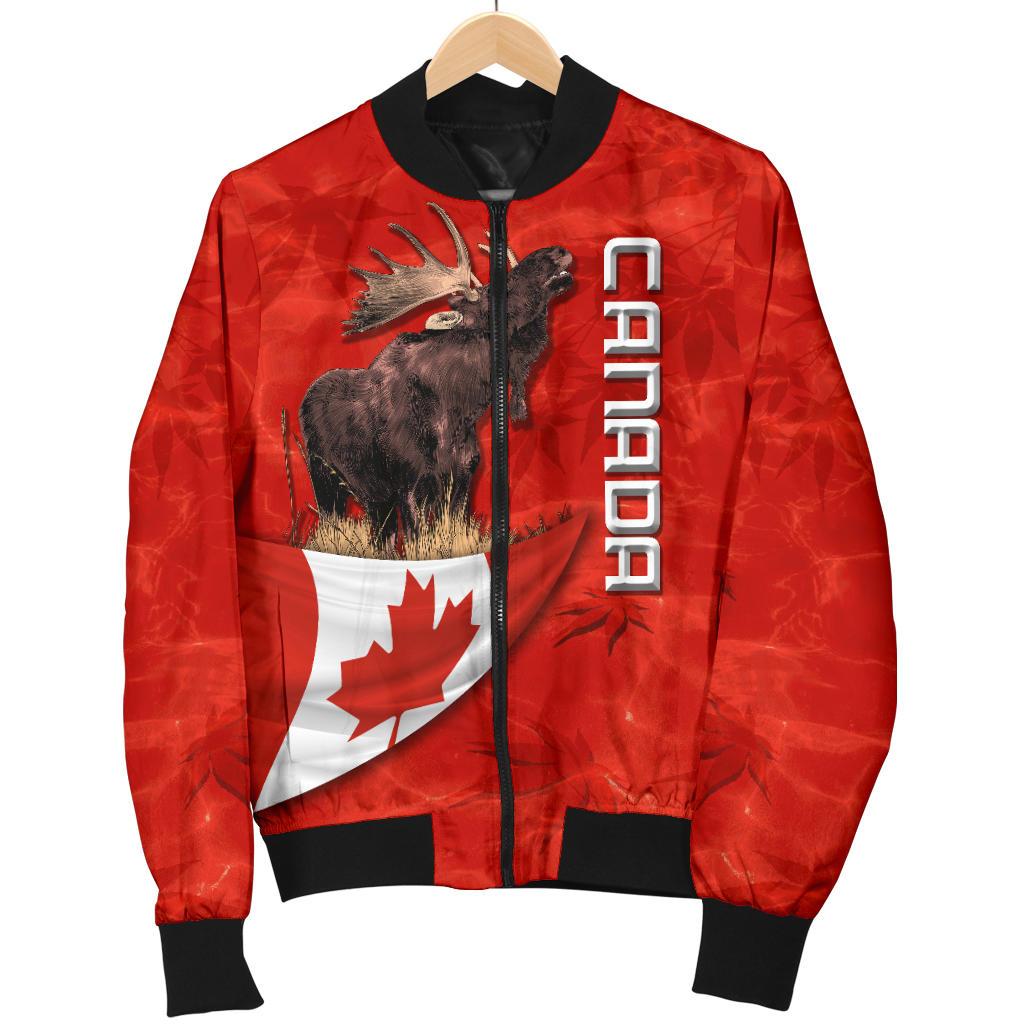Red bomber jacket on hanger with moose and Canada flag print, black ribbed cuffs.