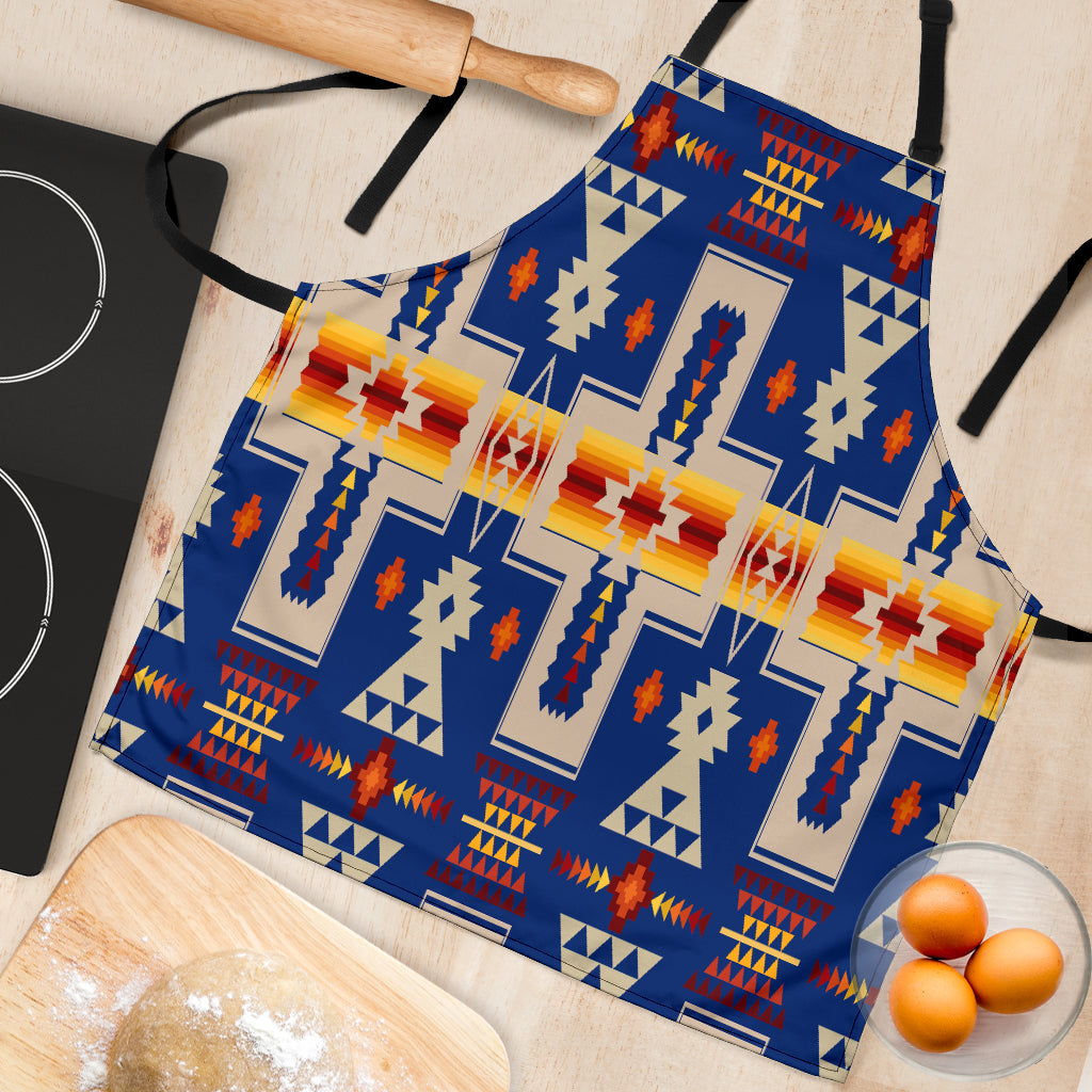Close-up of blue apron fabric with multicolor geometric tribal pattern and black ties