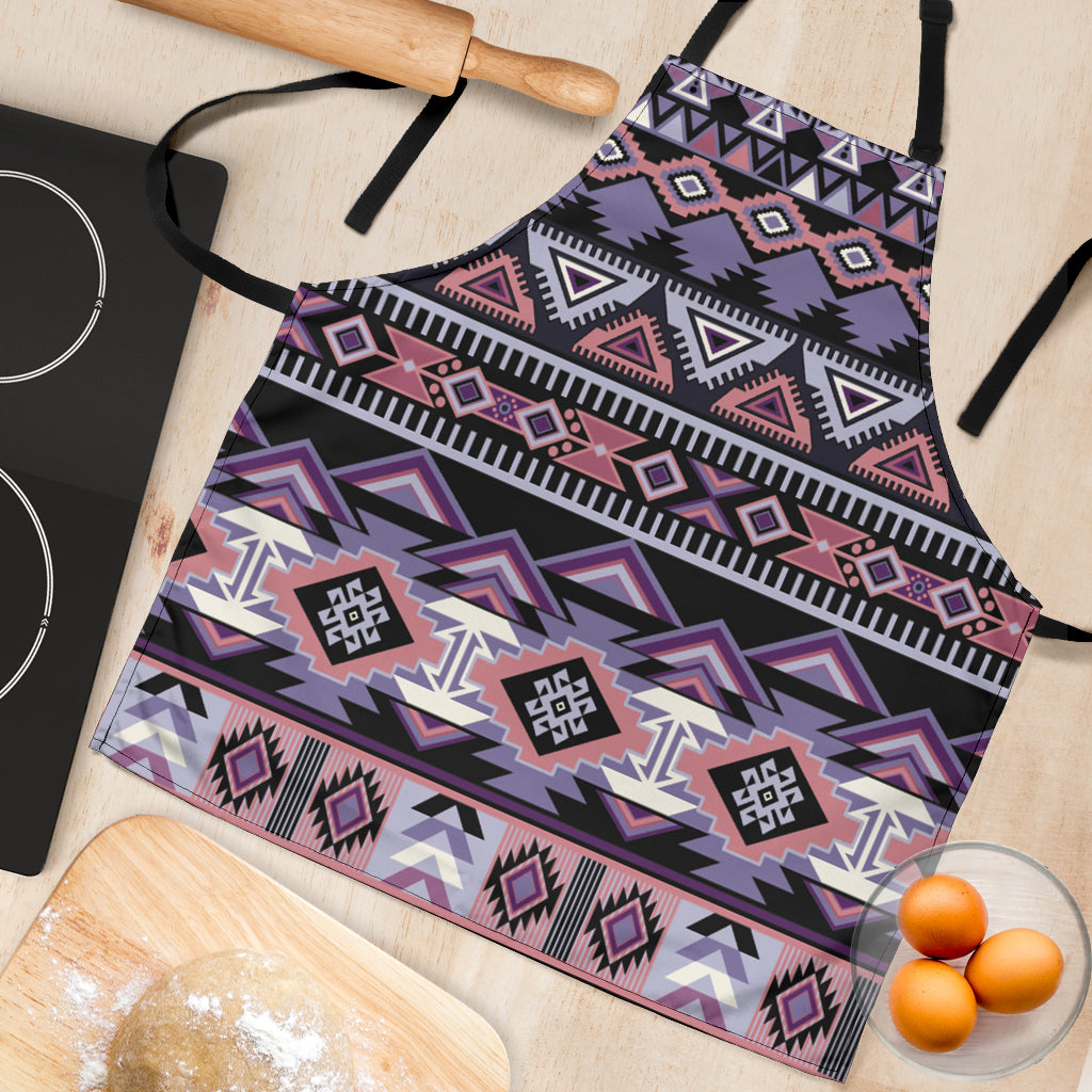 Close-up multicolor Native-style geometric apron fabric with black trim