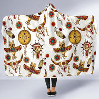 White hooded blanket with colorful Native-style symbol print: horses, sunburst, dreamcatchers