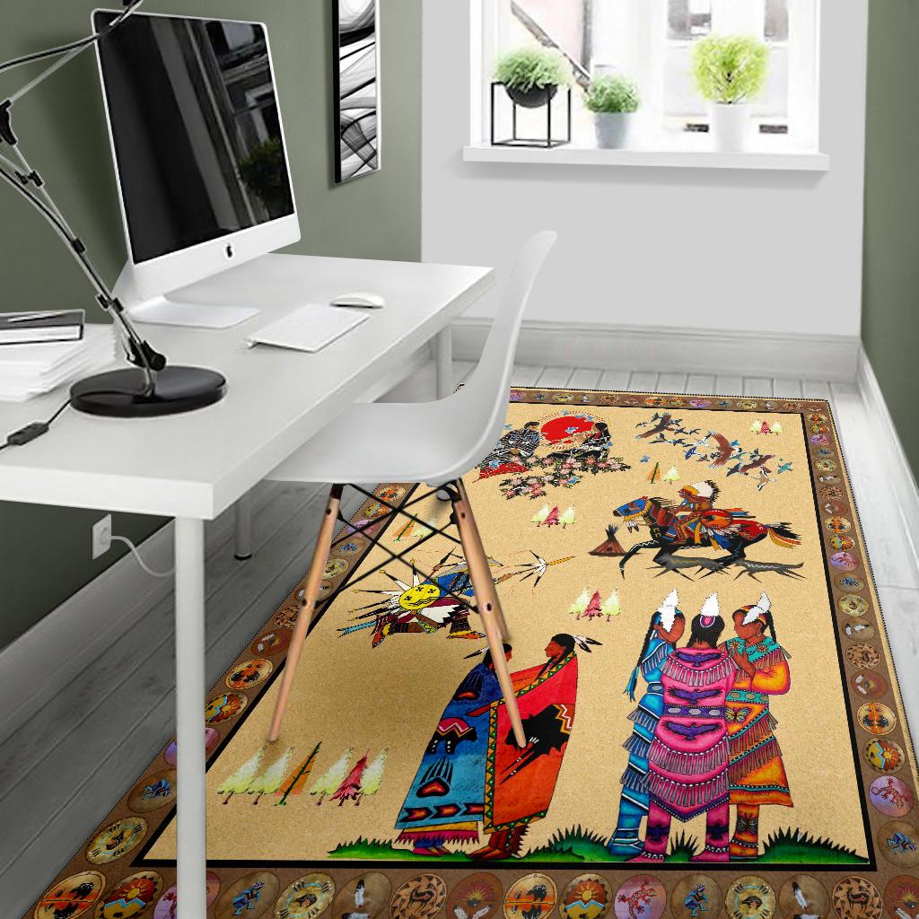 Beige Native American style area rug with illustrated people, birds, and decorative border