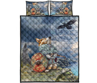 Set on white: blue quilt panel with corgi Viking warrior and shield, plus two pillow covers