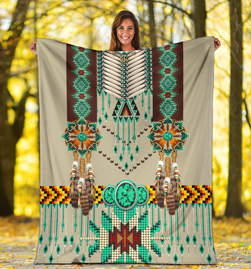 Breastplate blanket displayed outdoors with teal accents, feather design, and diamond trim
