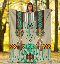 Breastplate blanket displayed outdoors with teal accents, feather design, and diamond trim