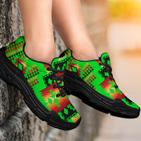 On-foot green native-print chunky sneakers with black laces and thick sole