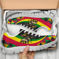 Ethiopia-themed sneakers with rasta lion graphic, multicolor geometric stripes, black upper