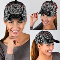 Black Viking cap with raven-and-runes print, white linework and red accents on models