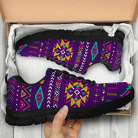 Light purple tribal print sneakers in box, black tread sole and multicolor patterns