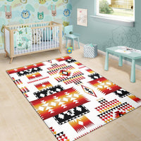 Native geometric area rug: white ground with red stripes, black motifs, yellow accents