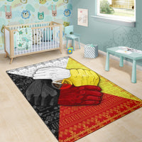 Medicine wheel hand area rug with white, yellow, red, and black hand artwork