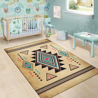 Southwest area rug, tan with central starburst and scattered triangle icons, black stripe border