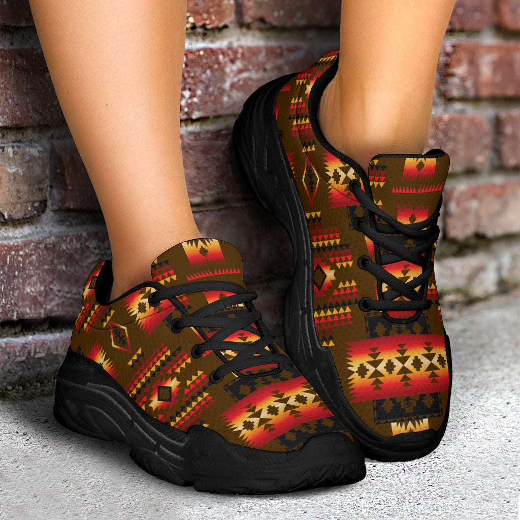 Chunky sneakers with black sole, Native tribal print and black laces on feet