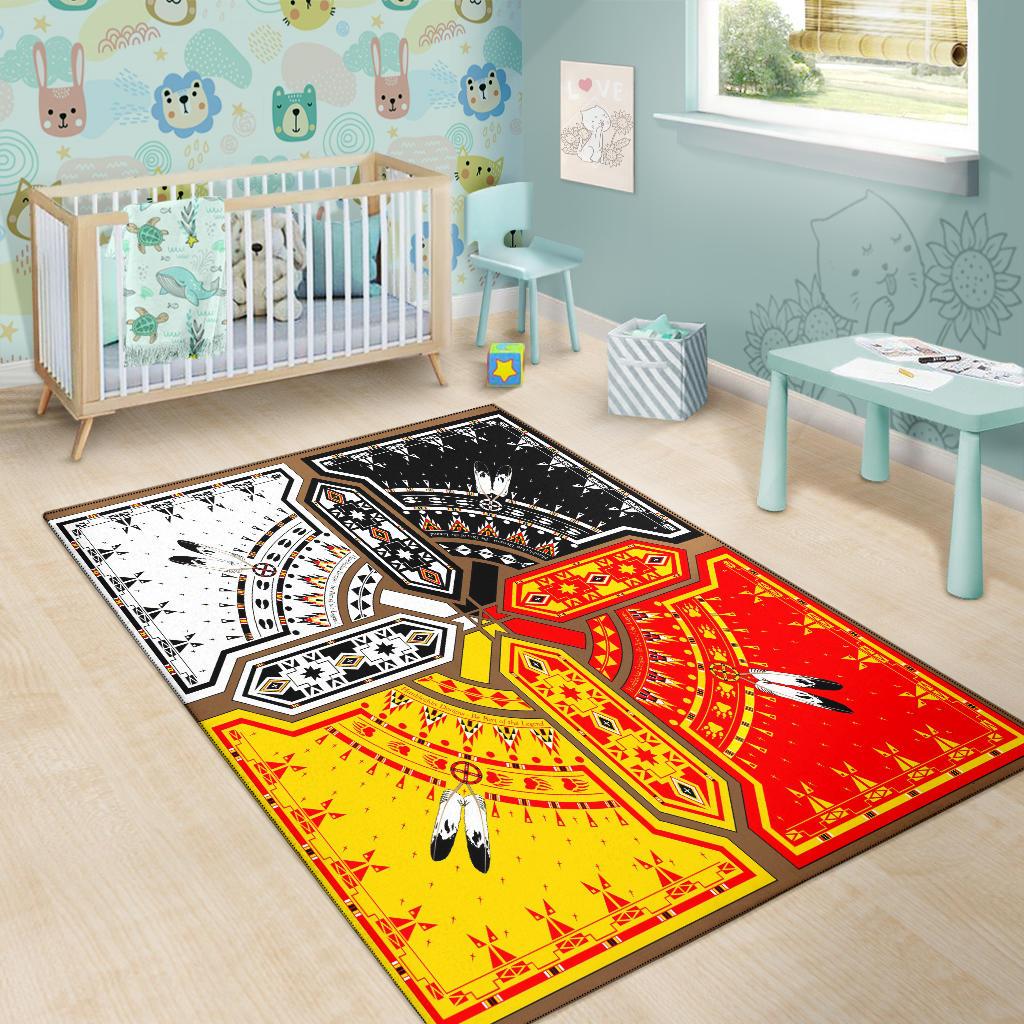Multicolor native American area rug laid flat in nursery setting, medicine wheel design